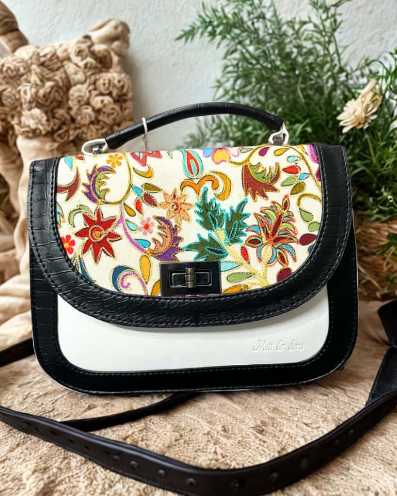 Sling bag/ Hand held bag